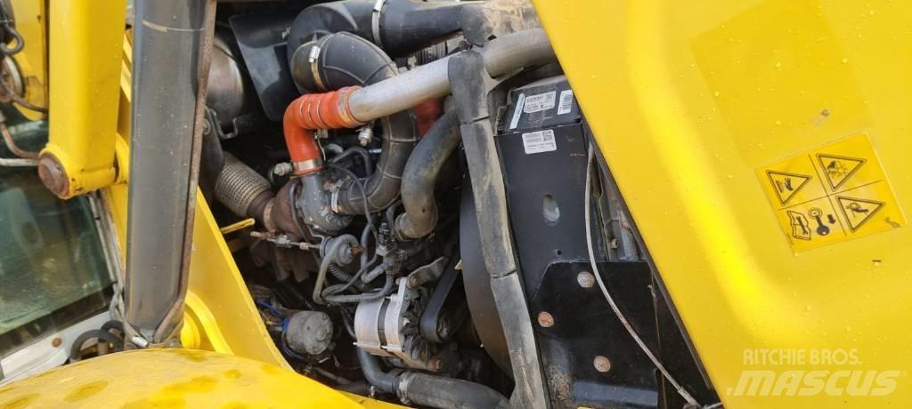 New Holland B 115 C Экскаваторы-погрузчики