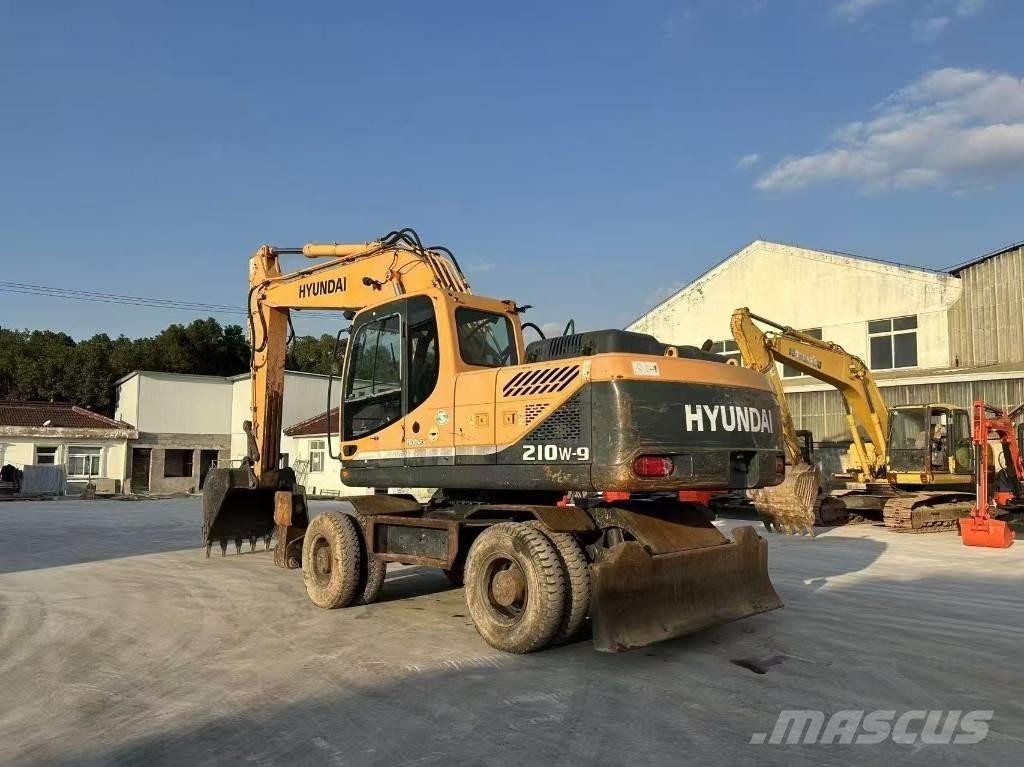 Hyundai 210W-9 Колёсные экскаваторы