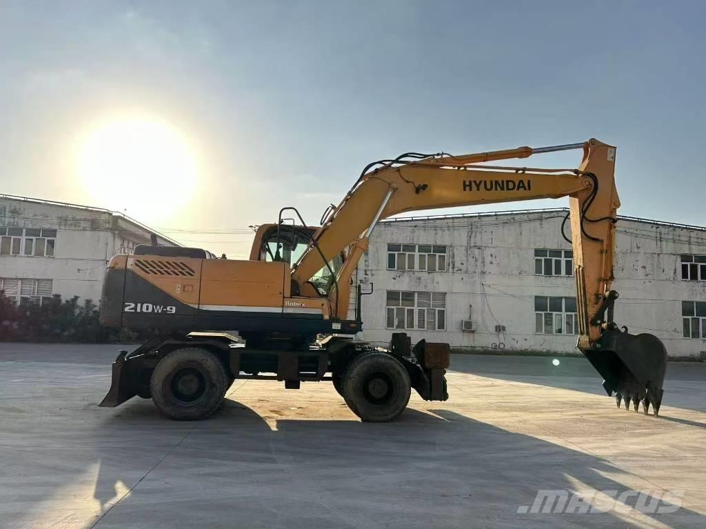 Hyundai 210W-9 Колёсные экскаваторы