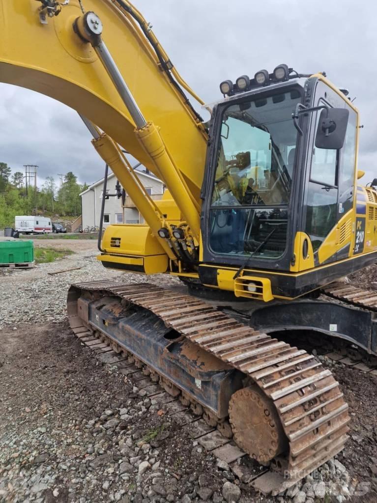 Komatsu PC 210 LC Гусеничные экскаваторы