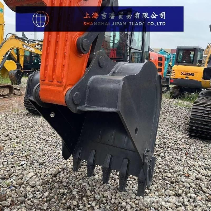 Doosan DX 225 Гусеничные экскаваторы