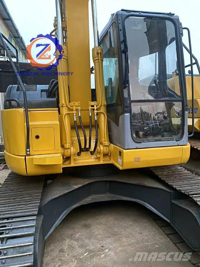 Komatsu PC 128 US Малые экскаваторы 7т-12т