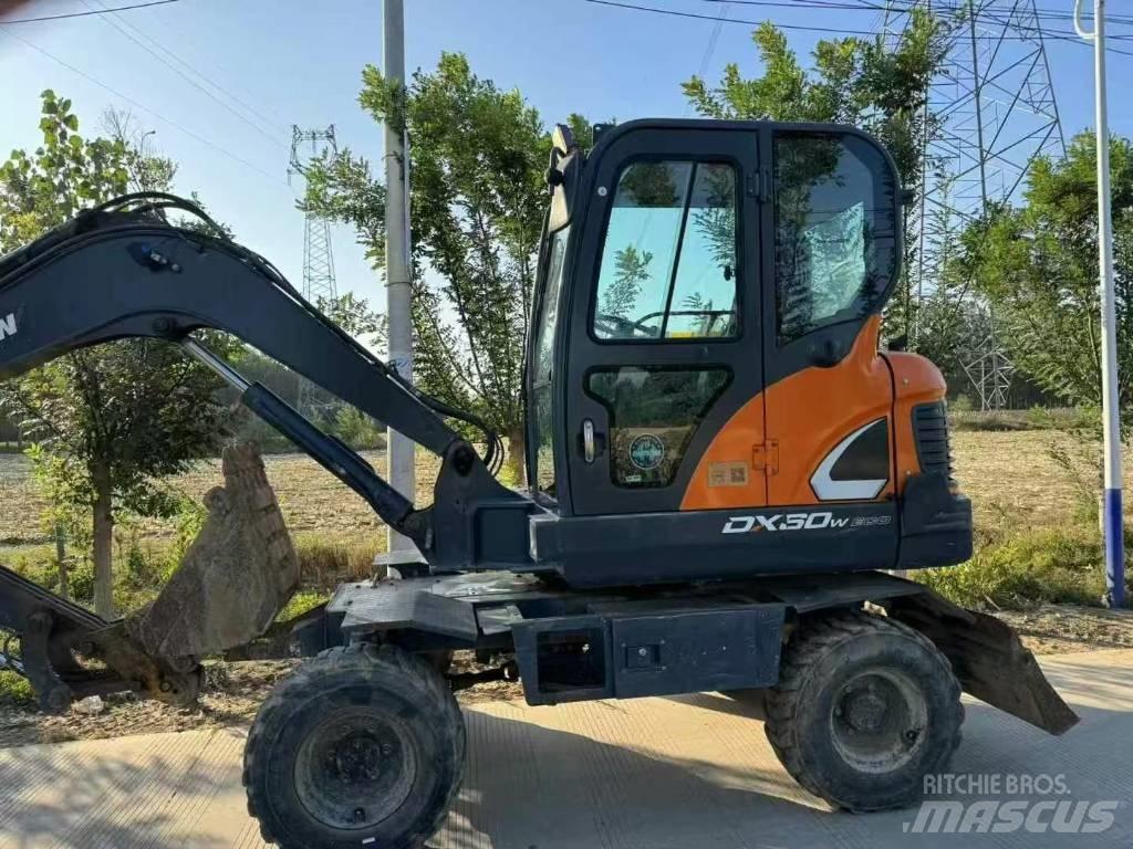 Doosan DX60W Колёсные экскаваторы