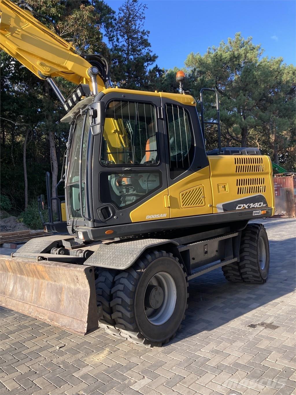 Doosan DX140W-5 Колёсные экскаваторы