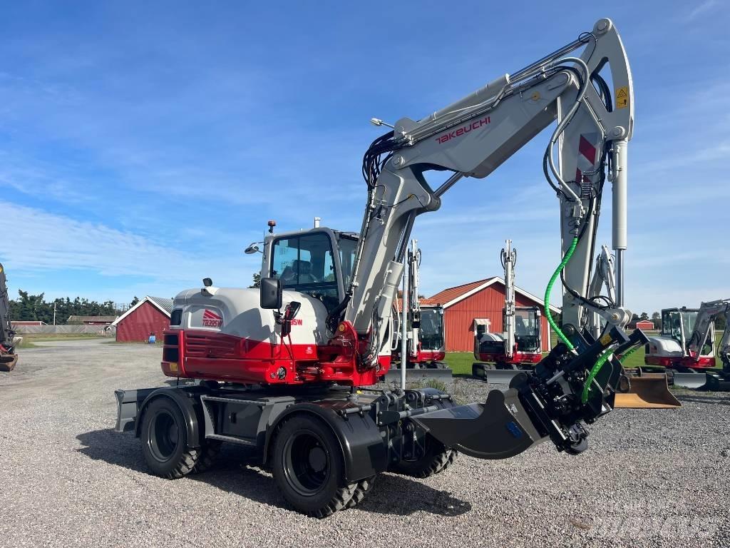 Takeuchi TB 395 W Колёсные экскаваторы