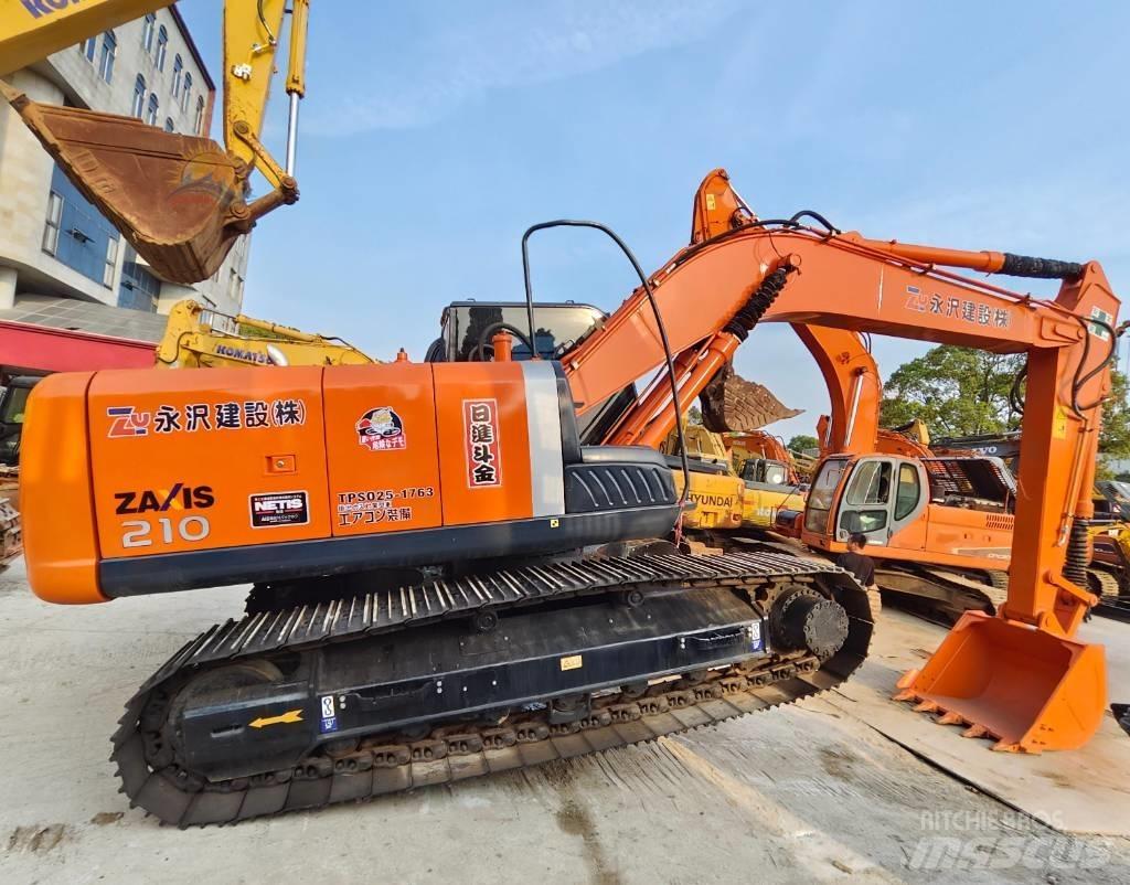 Hitachi ZX 210 Гусеничные экскаваторы