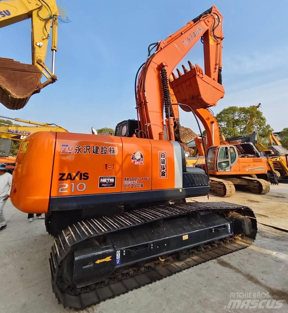 Hitachi ZX 210 Гусеничные экскаваторы