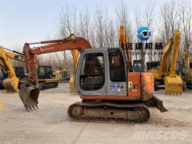 Hitachi EX60-5 Гусеничные экскаваторы