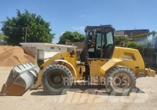 New Holland 12 D Фронтальные погрузчики