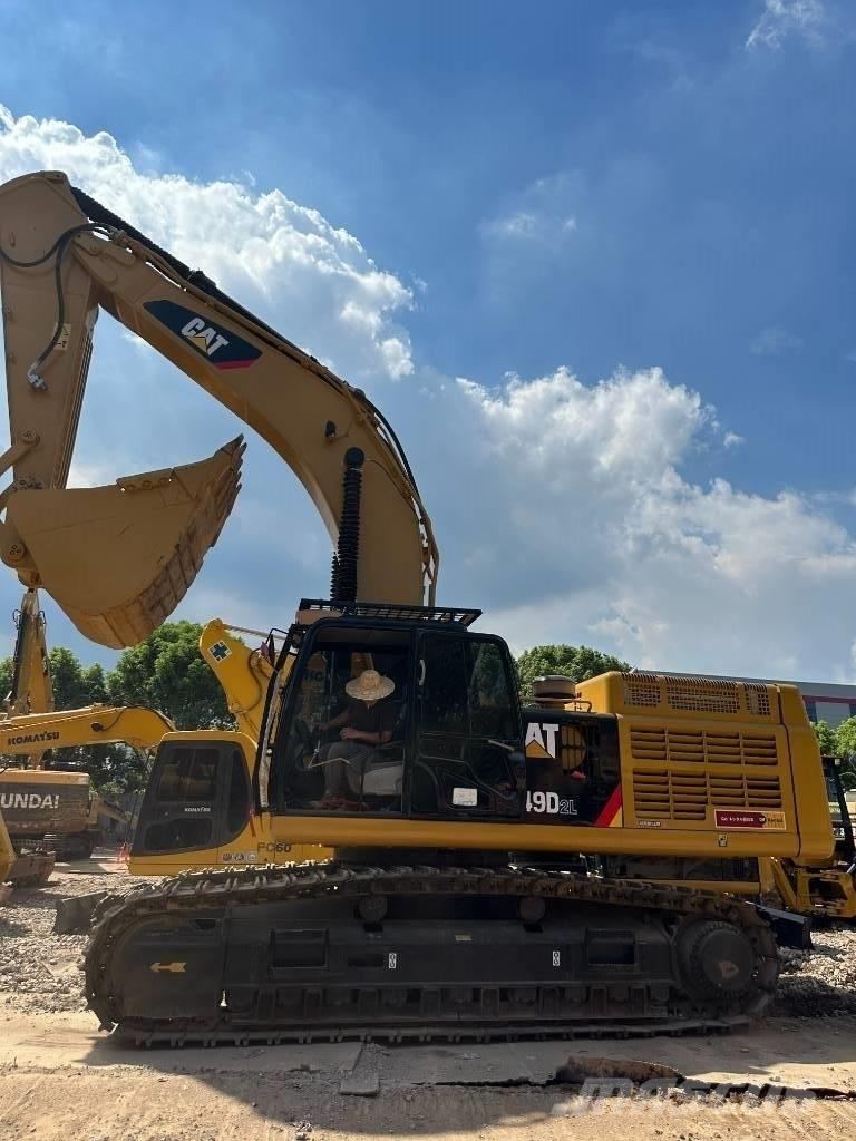CAT 349 D L Малые экскаваторы 7т-12т