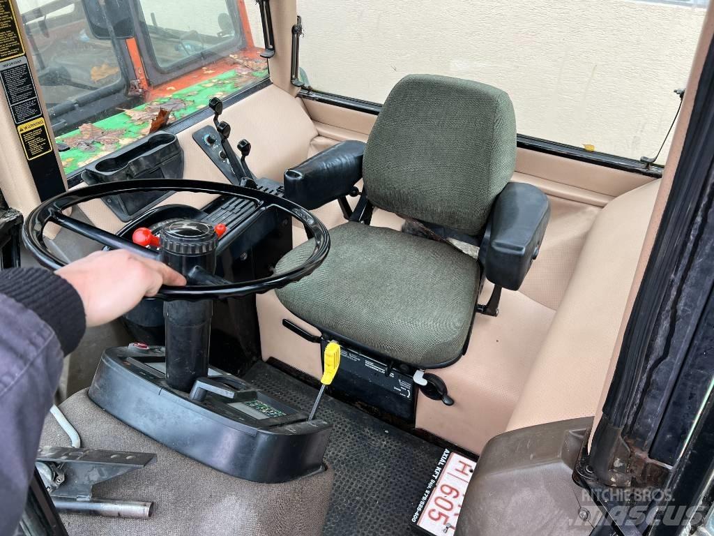John Deere 4755 Трактора