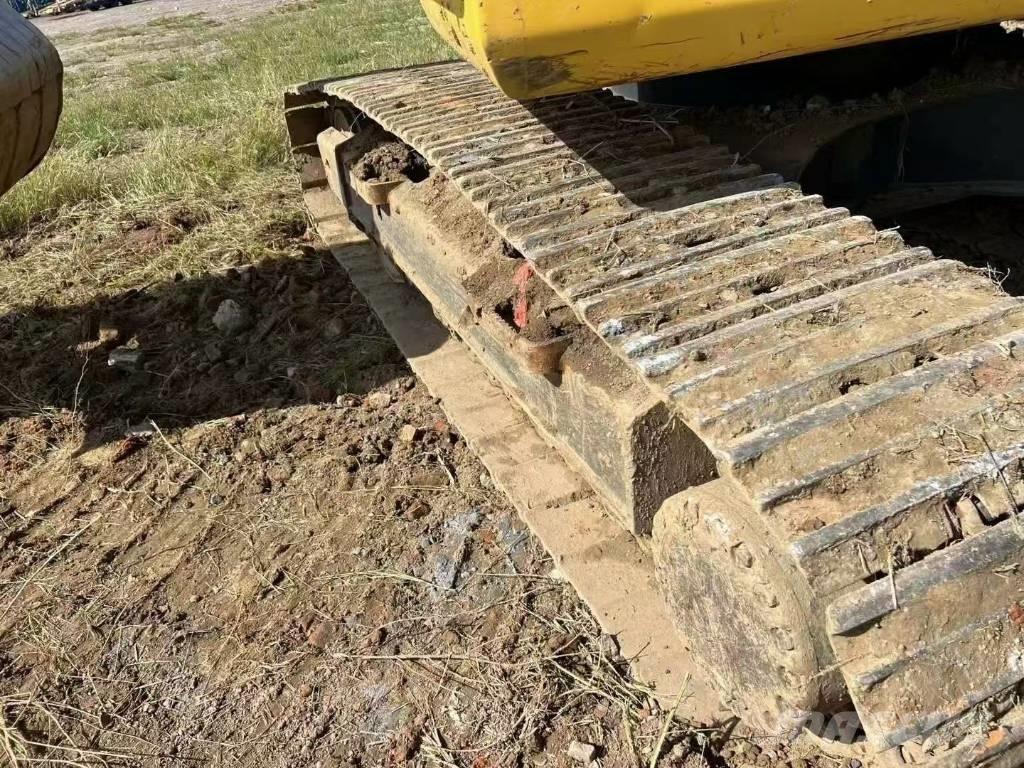 Komatsu PC 200 Гусеничные экскаваторы