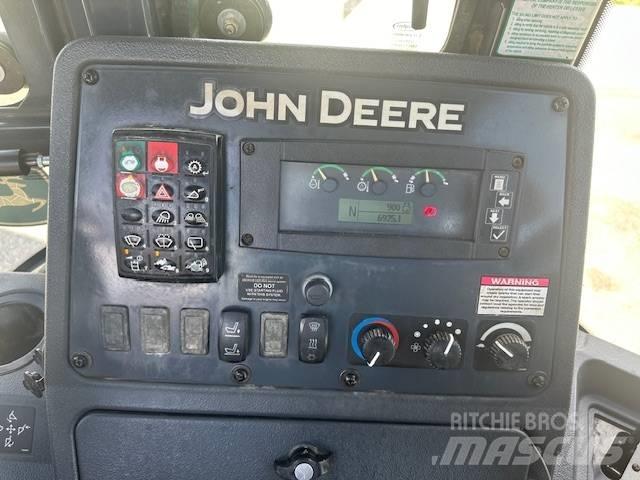 John Deere 410 K Экскаваторы-погрузчики
