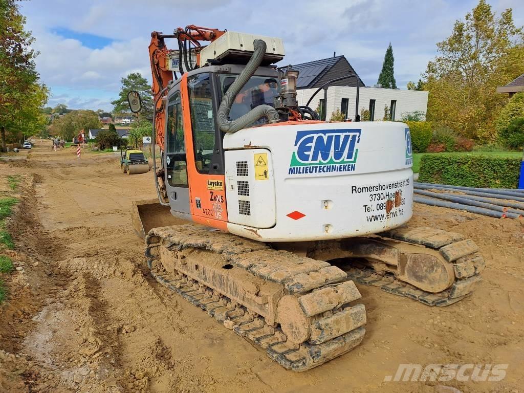 Hitachi ZX135US Гусеничные экскаваторы
