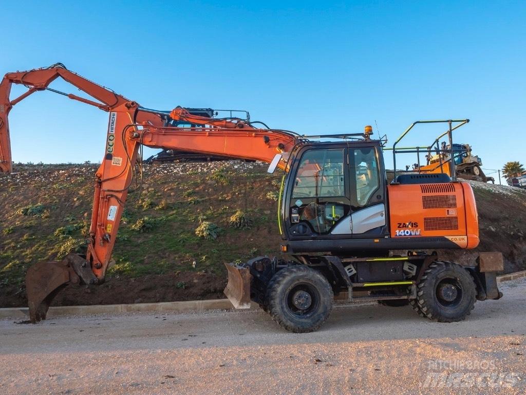 Hitachi 140W Колёсные экскаваторы