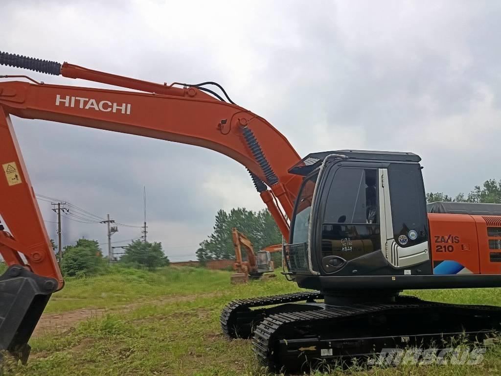 Hitachi ZX 210 Гусеничные экскаваторы