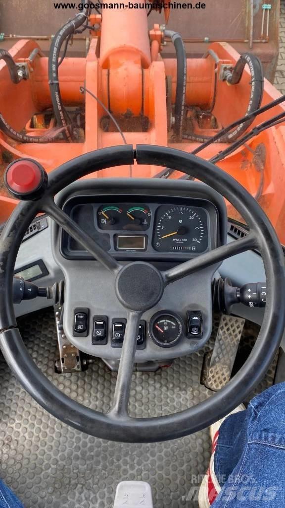 Hitachi LX 210 E Фронтальные погрузчики