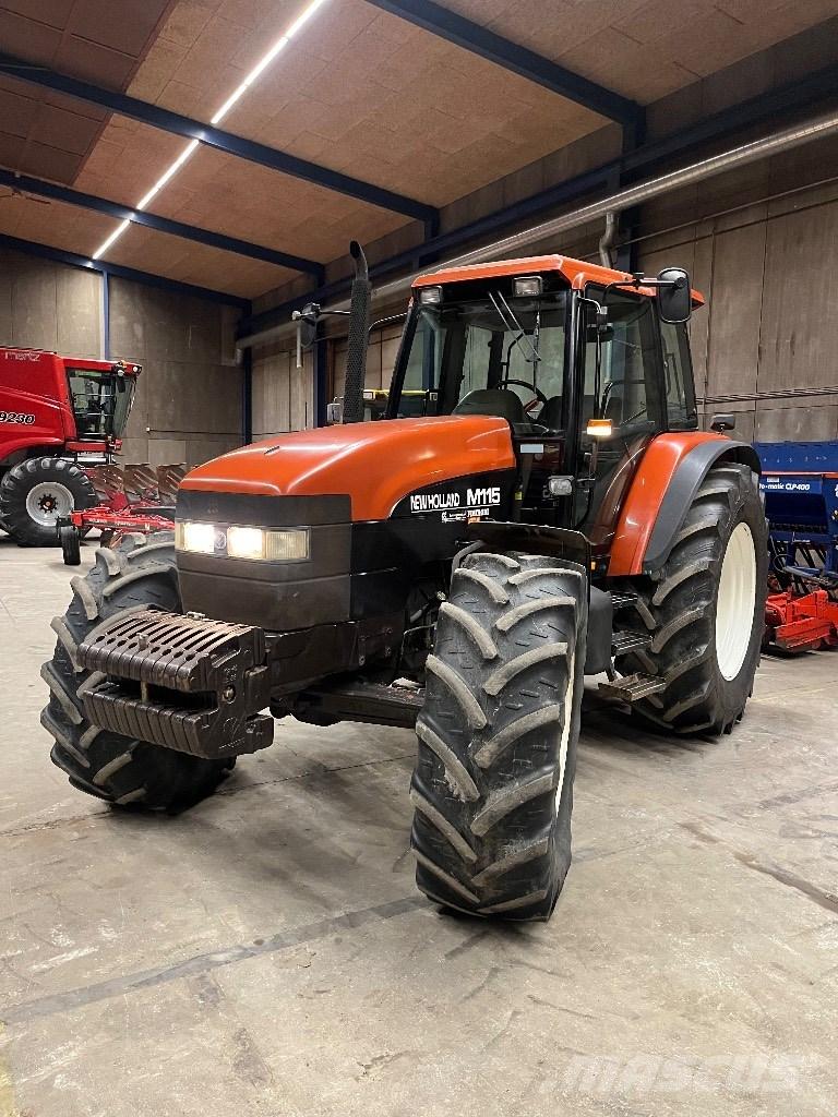 New Holland M 115 Трактора