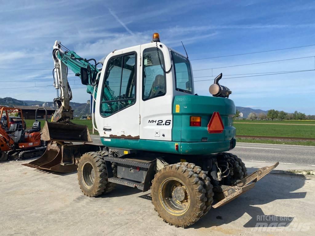 New Holland MH 2.6 Колёсные экскаваторы