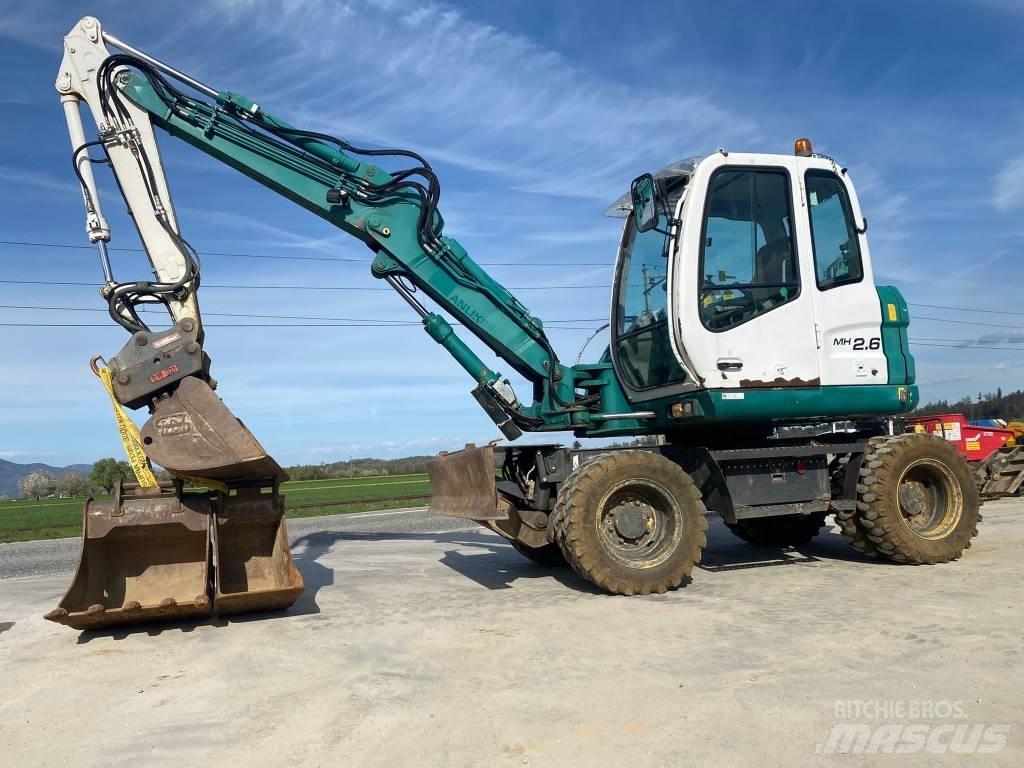 New Holland MH 2.6 Колёсные экскаваторы
