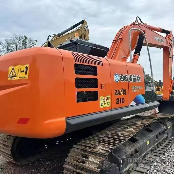 Hitachi ZX210 Гусеничные экскаваторы
