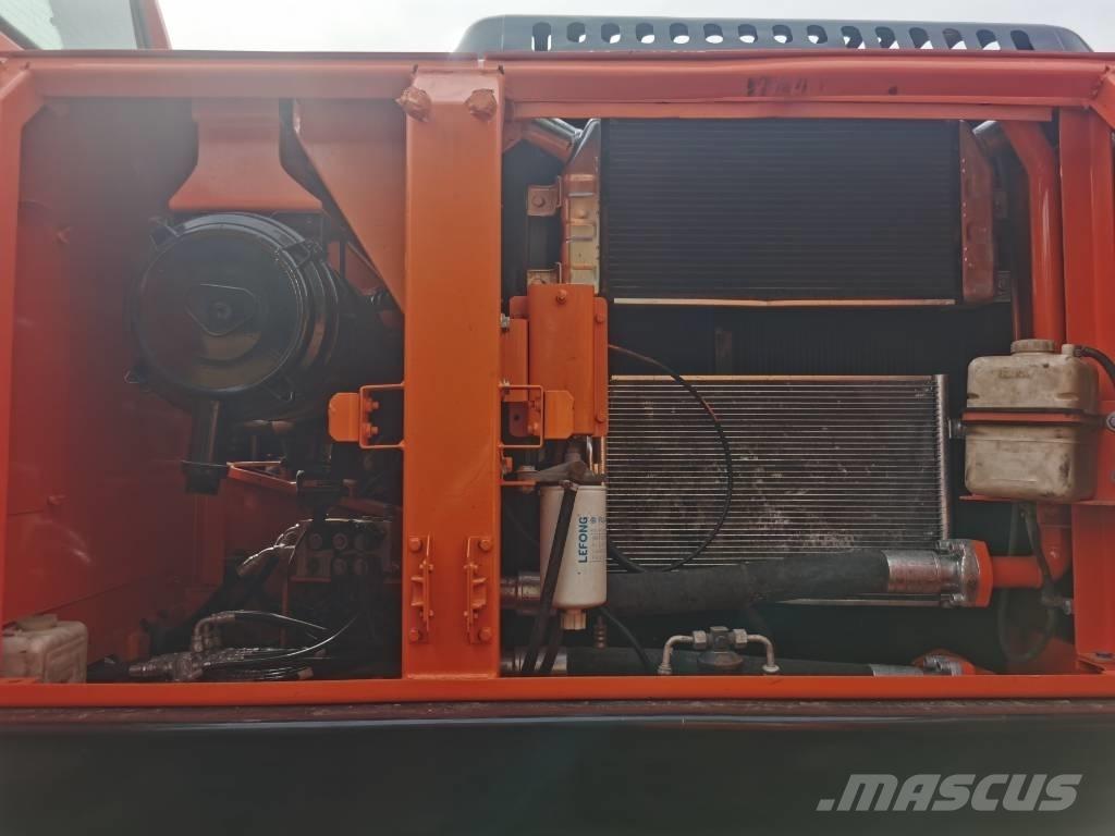 Doosan DX225LC-9C Гусеничные экскаваторы