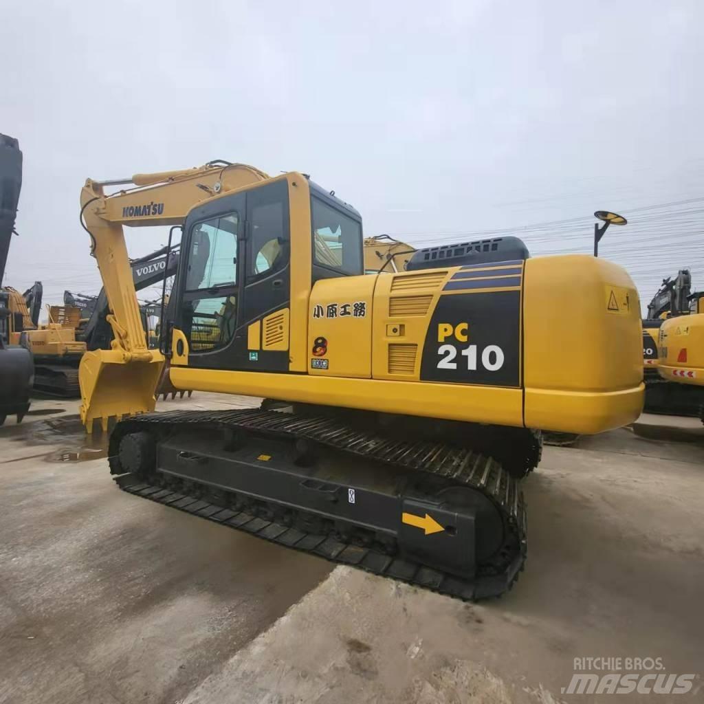Komatsu PC 210 Гусеничные экскаваторы