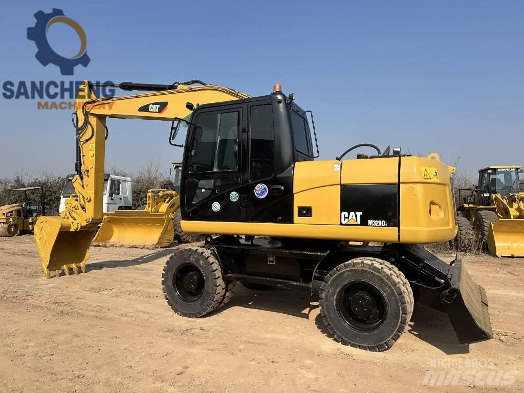 CAT M 320 D Колёсные экскаваторы