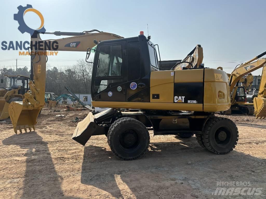 CAT M 320 D Колёсные экскаваторы