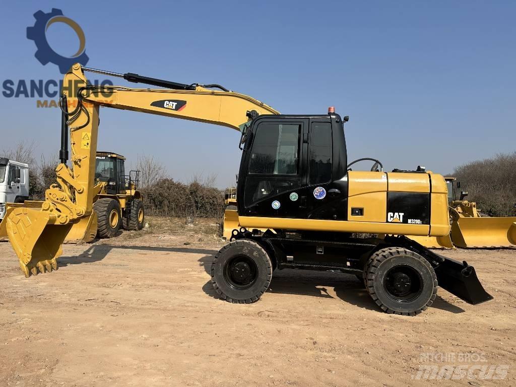 CAT M 320 D Колёсные экскаваторы