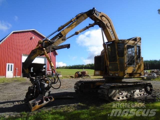 John Deere 653G Харвестеры