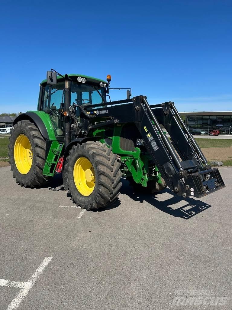 John Deere 7530 Трактора