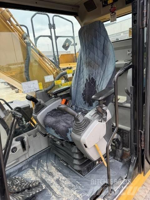 CAT 323 E Гусеничные экскаваторы