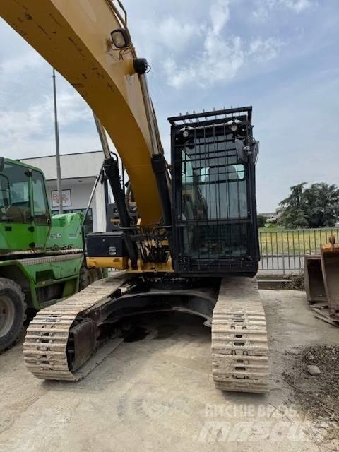 CAT 323 E Гусеничные экскаваторы