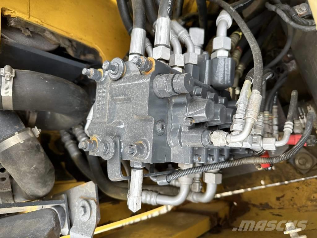 Komatsu PC78US Малые экскаваторы 7т-12т