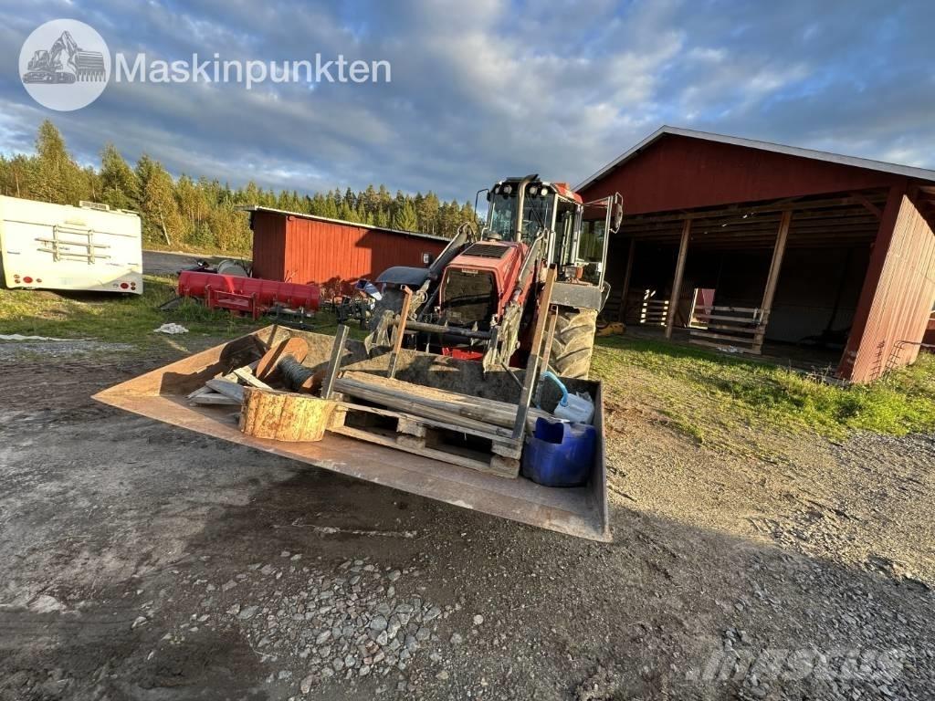 Huddig 1260 B Экскаваторы-погрузчики