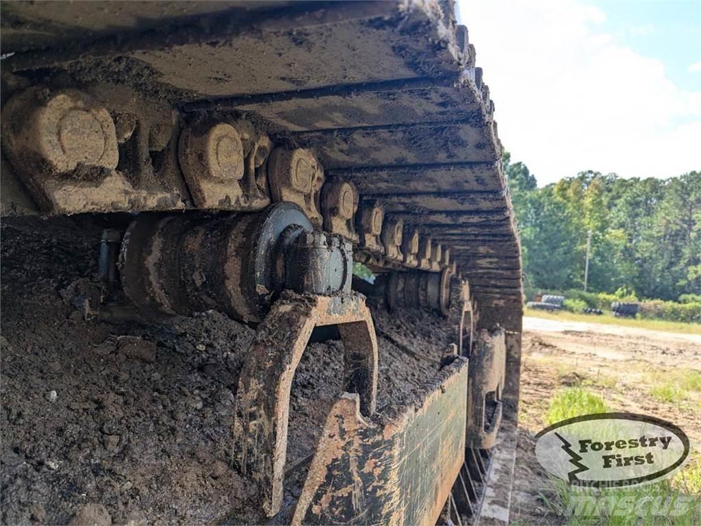 CAT 325D-FM Лесопогрузчик