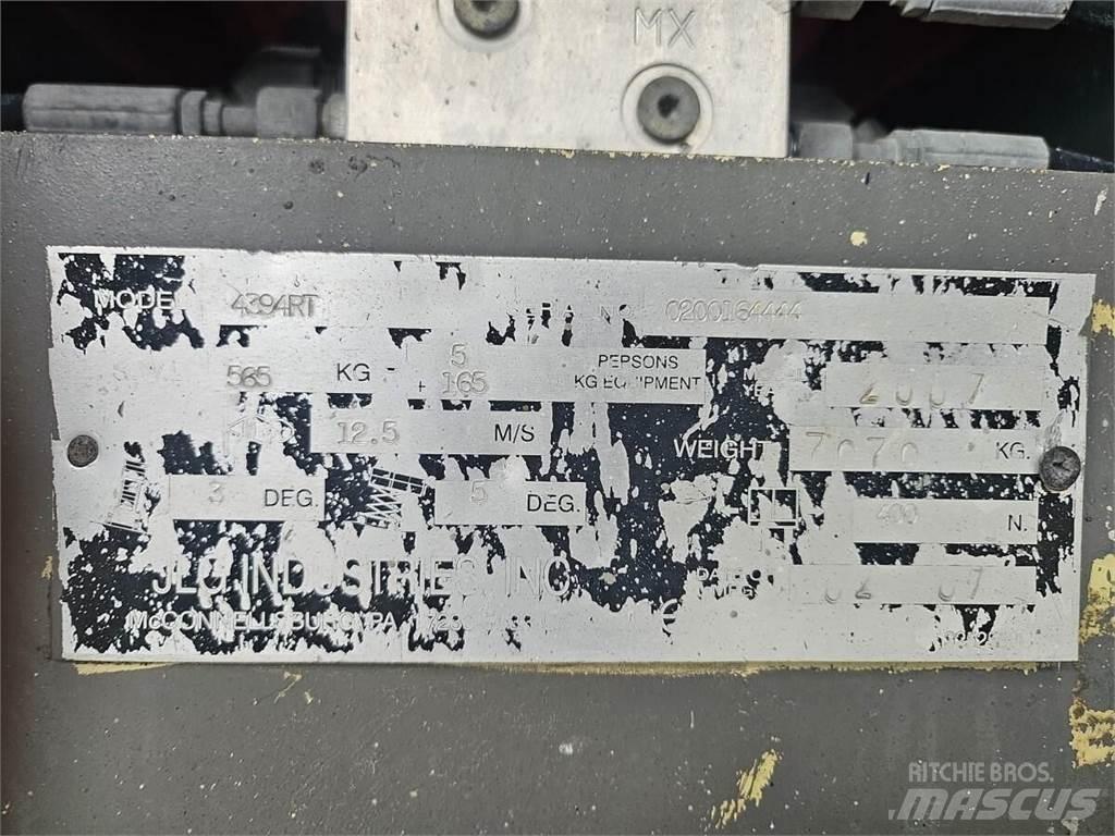 JLG 4394RT Ножничные подъемники