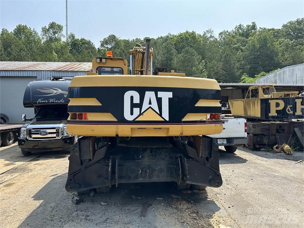 CAT M320 Колёсные экскаваторы