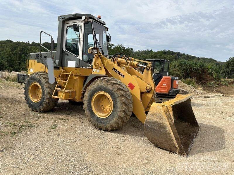 Daewoo MG200 Фронтальные погрузчики