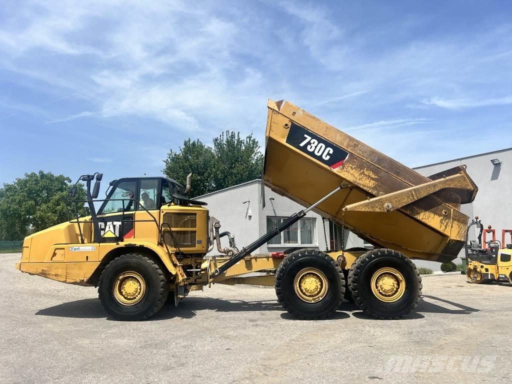 CAT 730 C Шарнирно-сочленённые самосвалы