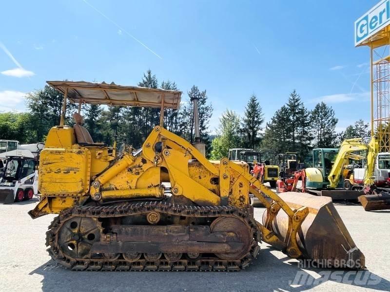 CAT 933F Гусеничные фронтальные погрузчики