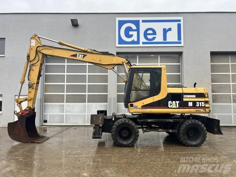 CAT M 315 Колёсные экскаваторы