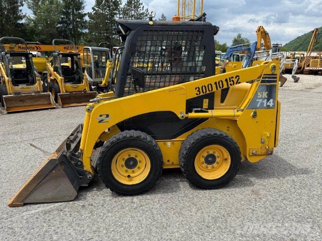 Komatsu SK714-5 Мини-погрузчики