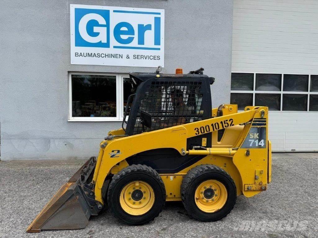 Komatsu SK714-5 Мини-погрузчики