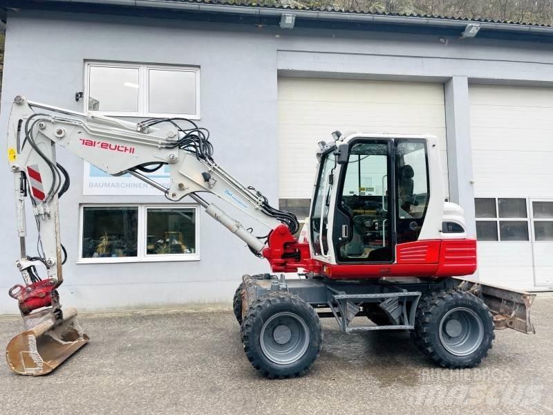 Takeuchi TB295W Колёсные экскаваторы