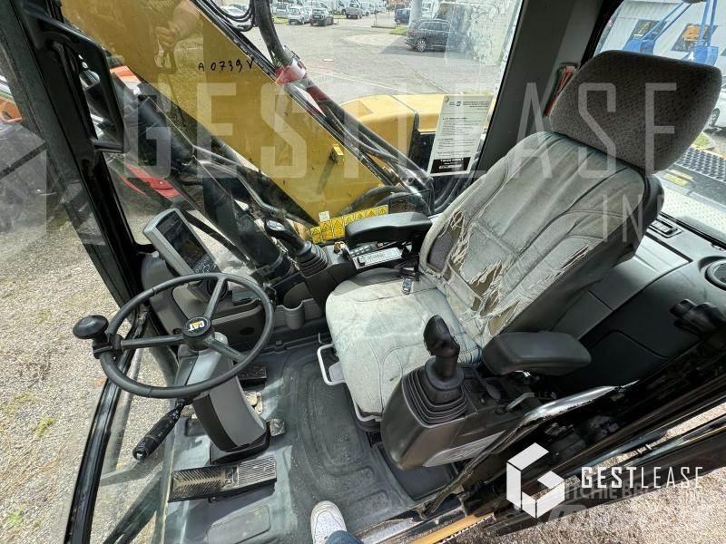 CAT M313D Колёсные экскаваторы