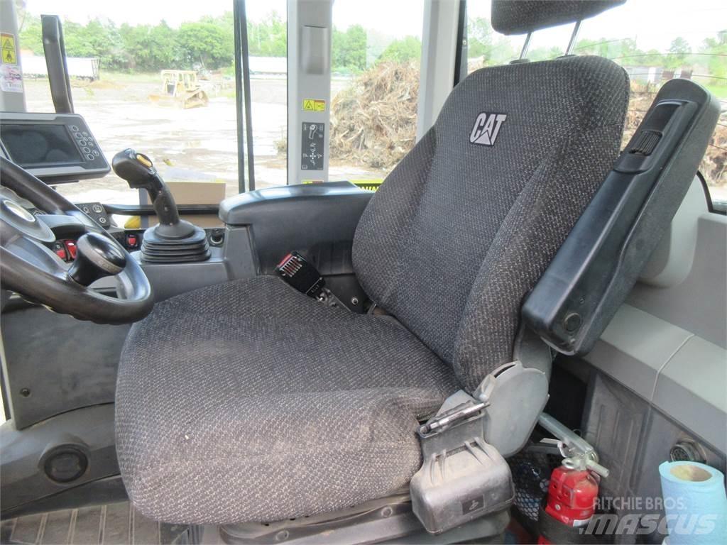 CAT 938M Фронтальные погрузчики
