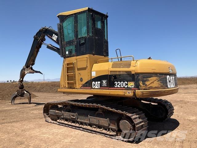CAT 320C Лесопогрузчик