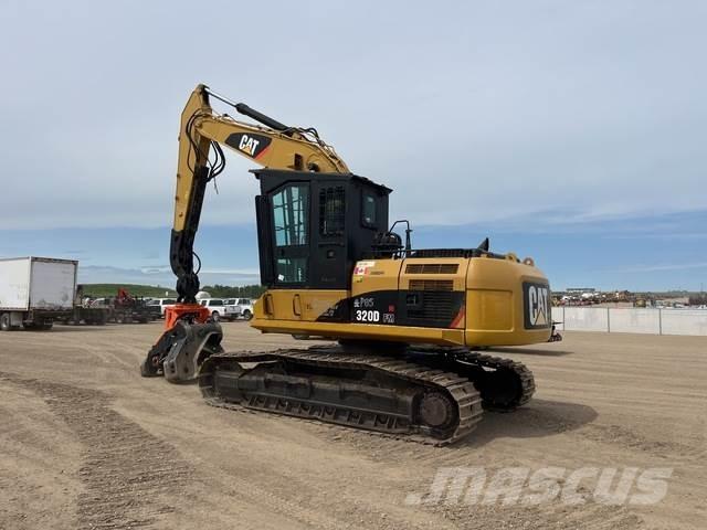 CAT 320DFM Дровоколы